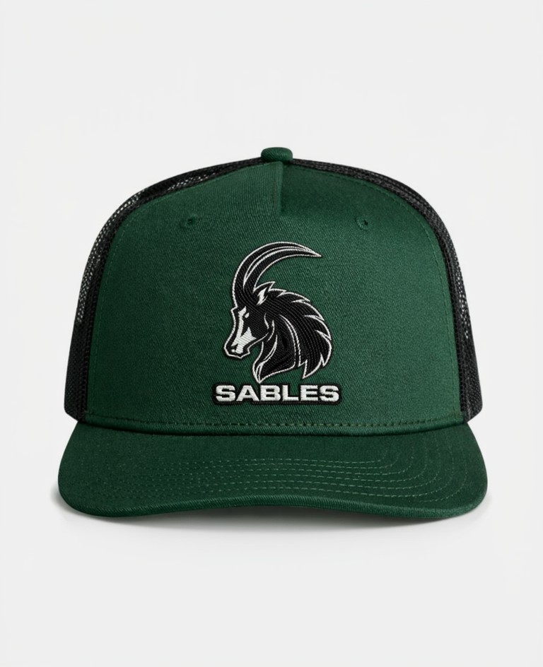 Green cap with black mesh and goat logo labeled 'Sables' on a white background