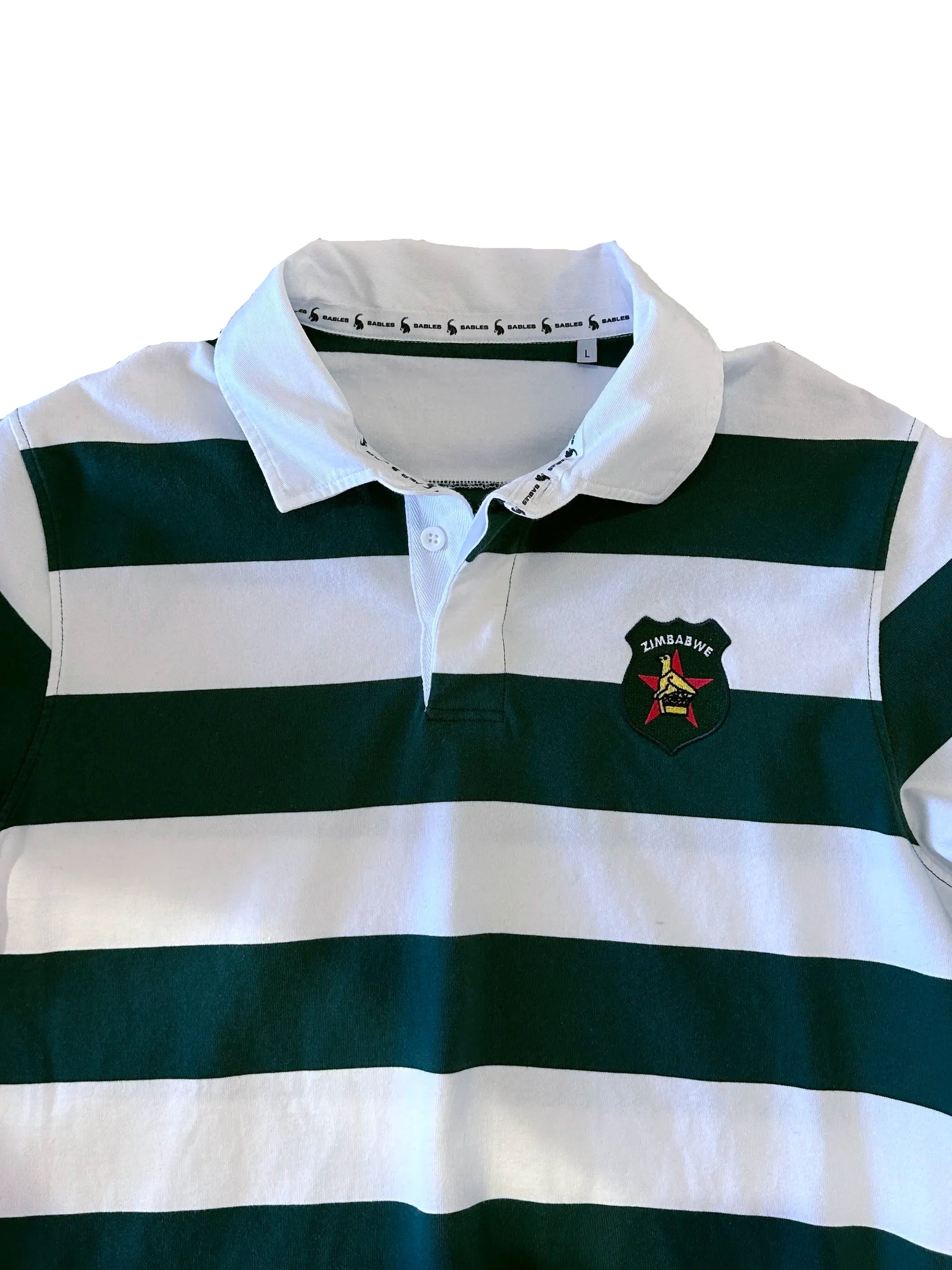 Front view of the Zimbabwe rugby supporters jersey in green and white stripes, featuring a white collar and embroidered Zimbabwe crest on the left chest.